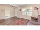 Cozy living room featuring a large window, wood floors, and a warm color scheme at 4707 Hannah Dr, Rock Hill, SC 29732