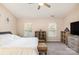 Main bedroom featuring a cozy seating area, ceiling fan, and natural light at 4707 Hannah Dr, Rock Hill, SC 29732