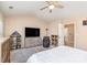 Bedroom featuring a comfortable queen bed, ceiling fan, and modern furnishings at 4707 Hannah Dr, Rock Hill, SC 29732