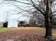 Large backyard with shed and mature trees at 5105 Chelsey Ln, Monroe, NC 28110