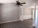 Spacious dining room with gray walls, wood-look flooring, and white columns at 5105 Chelsey Ln, Monroe, NC 28110