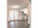 Bright dining room with hardwood floors and access to the kitchen at 5105 Chelsey Ln, Monroe, NC 28110