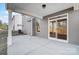 Covered patio with sliding glass doors leading to the backyard at 5226 Verona Rd # 81, Charlotte, NC 28213