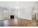 Spacious basement with hardwood floors and a fireplace at 5226 Verona Rd # 81, Charlotte, NC 28213