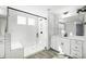 Modern bathroom with white subway tiles and a glass shower at 5226 Verona Rd # 81, Charlotte, NC 28213