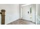 Bright entryway with hardwood floors and wainscoting at 5226 Verona Rd # 81, Charlotte, NC 28213