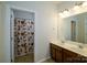 Bathroom with double vanity and shower at 8428 Loxton Cir, Charlotte, NC 28214