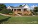 Community clubhouse with welcoming porch at 8428 Loxton Cir, Charlotte, NC 28214