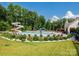 Community pool with water slide and lounge chairs at 8428 Loxton Cir, Charlotte, NC 28214