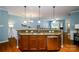 Kitchen with large island, granite countertops, and stainless steel dishwasher at 8428 Loxton Cir, Charlotte, NC 28214