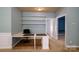 Home office with built-in shelves and desk at 8428 Loxton Cir, Charlotte, NC 28214