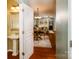 Stylish powder room with pedestal sink and decorative wallpaper at 8428 Loxton Cir, Charlotte, NC 28214