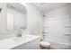 Clean bathroom with white tub and vanity at 112 Bickett Ave, Gastonia, NC 28052