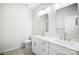 Double vanity bathroom with modern fixtures and a large mirror at 112 Bickett Ave, Gastonia, NC 28052