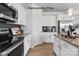 Kitchen with stainless steel appliances and granite countertops at 11933 Cabera Ln, Midland, NC 28107