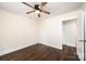 Spacious bedroom featuring hardwood floors and ceiling fan at 2186 W Nc 10 Hwy, Newton, NC 28658