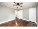 Charming bedroom with hardwood floors and ceiling fan at 2186 W Nc 10 Hwy, Newton, NC 28658