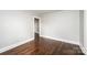 Well-lit bedroom with hardwood floors and neutral walls at 2186 W Nc 10 Hwy, Newton, NC 28658
