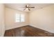 Spacious bedroom with hardwood floors and window at 2186 W Nc 10 Hwy, Newton, NC 28658