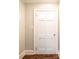 Simple entryway with hardwood floors and neutral walls at 2186 W Nc 10 Hwy, Newton, NC 28658