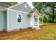 Newly renovated home with gray siding and stone accents at 2186 W Nc 10 Hwy, Newton, NC 28658