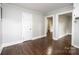 Bright hallway with hardwood floors and access to rooms at 2186 W Nc 10 Hwy, Newton, NC 28658