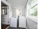 Laundry room with washer, dryer, and ample space at 2186 W Nc 10 Hwy, Newton, NC 28658