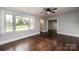 Bright living room with hardwood floors and large window at 2186 W Nc 10 Hwy, Newton, NC 28658