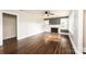 Bright living room features hardwood floors, fireplace, and neutral walls at 2186 W Nc 10 Hwy, Newton, NC 28658