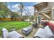 Large backyard with patio furniture and grill at 2526 Normandy Rd, Charlotte, NC 28209