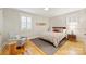 Bright bedroom with hardwood floors and window shutters at 2526 Normandy Rd, Charlotte, NC 28209