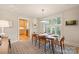 Elegant dining room with hardwood floors and a view of the kitchen at 2526 Normandy Rd, Charlotte, NC 28209