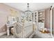 Charming Bedroom with a crib and plenty of storage at 2844 Georgia Ave, Charlotte, NC 28205
