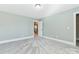 Spacious bedroom with carpeted floor and neutral walls at 2844 Georgia Ave, Charlotte, NC 28205