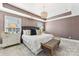 Spacious bedroom with plush carpet and large windows at 2844 Georgia Ave, Charlotte, NC 28205