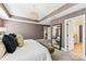 Spacious main bedroom with neutral decor and elegant chandelier at 2844 Georgia Ave, Charlotte, NC 28205
