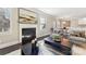 Living area features a fireplace and comfortable seating with adjacent dining area at 2844 Georgia Ave, Charlotte, NC 28205