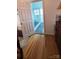 Bathroom entry showcasing a frameless glass shower and modern tile at 4000 Wilson Ln, Charlotte, NC 28206
