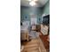 Bedroom with wood floors, a ceiling fan, and neutral-toned decor, creating a calming space at 4000 Wilson Ln, Charlotte, NC 28206