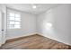 Bedroom with large window and ceiling fan at 613 Hops Aly, Fort Mill, SC 29715