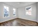 Bedroom with large windows and ceiling fan at 613 Hops Aly, Fort Mill, SC 29715
