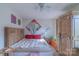 Spacious bedroom with large bed, dresser, and artwork at 3722 Park Rd # Q, Charlotte, NC 28209