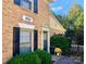 Brick building exterior with a well-maintained front entrance and landscaping at 3722 Park Rd # Q, Charlotte, NC 28209