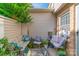 Private patio featuring comfortable seating and greenery at 3722 Park Rd # Q, Charlotte, NC 28209