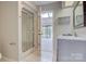 Clean bathroom with a shower, vanity, and window for natural light at 1652 12Th Ne St, Hickory, NC 28601