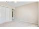 Cozy bedroom with neutral walls, carpet, closet, and natural light at 1652 12Th Ne St, Hickory, NC 28601