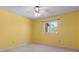 Bedroom featuring bright yellow walls and a window at 1652 12Th Ne St, Hickory, NC 28601