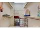 Walk-in closet featuring ample shelf storage and neutral carpet at 1652 12Th Ne St, Hickory, NC 28601