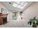 Bright living room with skylights, fireplace, sliding doors, and neutral colors for a cozy feel at 1652 12Th Ne St, Hickory, NC 28601