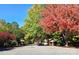 Street view showing mature trees and foliage in this neighborhood at 1652 12Th Ne St, Hickory, NC 28601